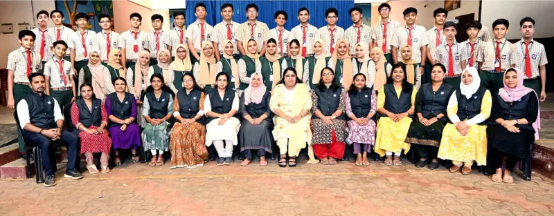The Apex Class X batch of 2025–26 with school staff